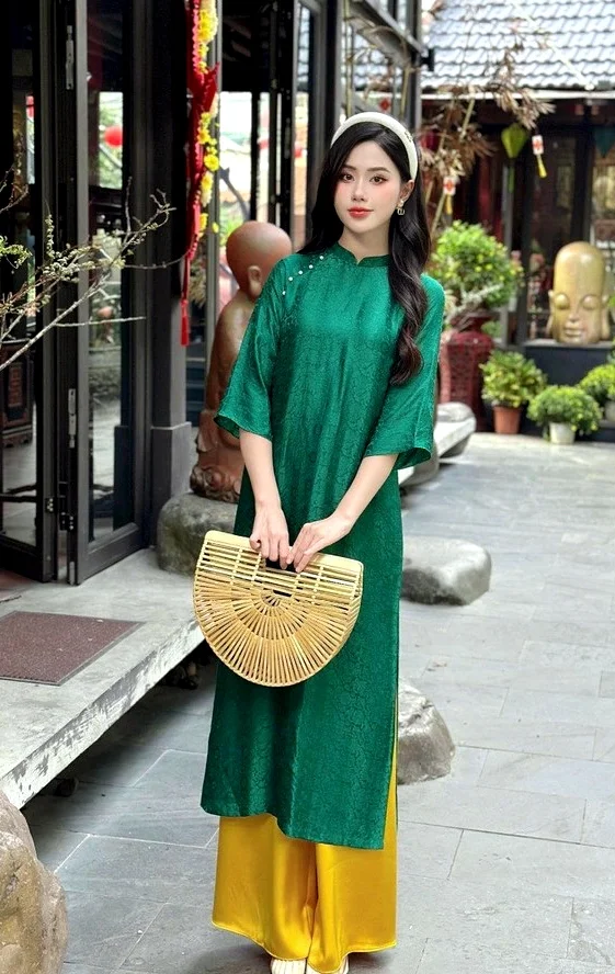Sự thanh lịch và tiện dụng của áo dài suông